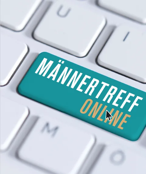 Eine Computertastatur, deren große Taste türkis eingefärbt ist und „Männertreff Online“ trägt.